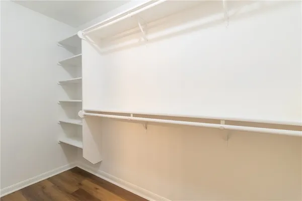 a view of an empty walk in closet