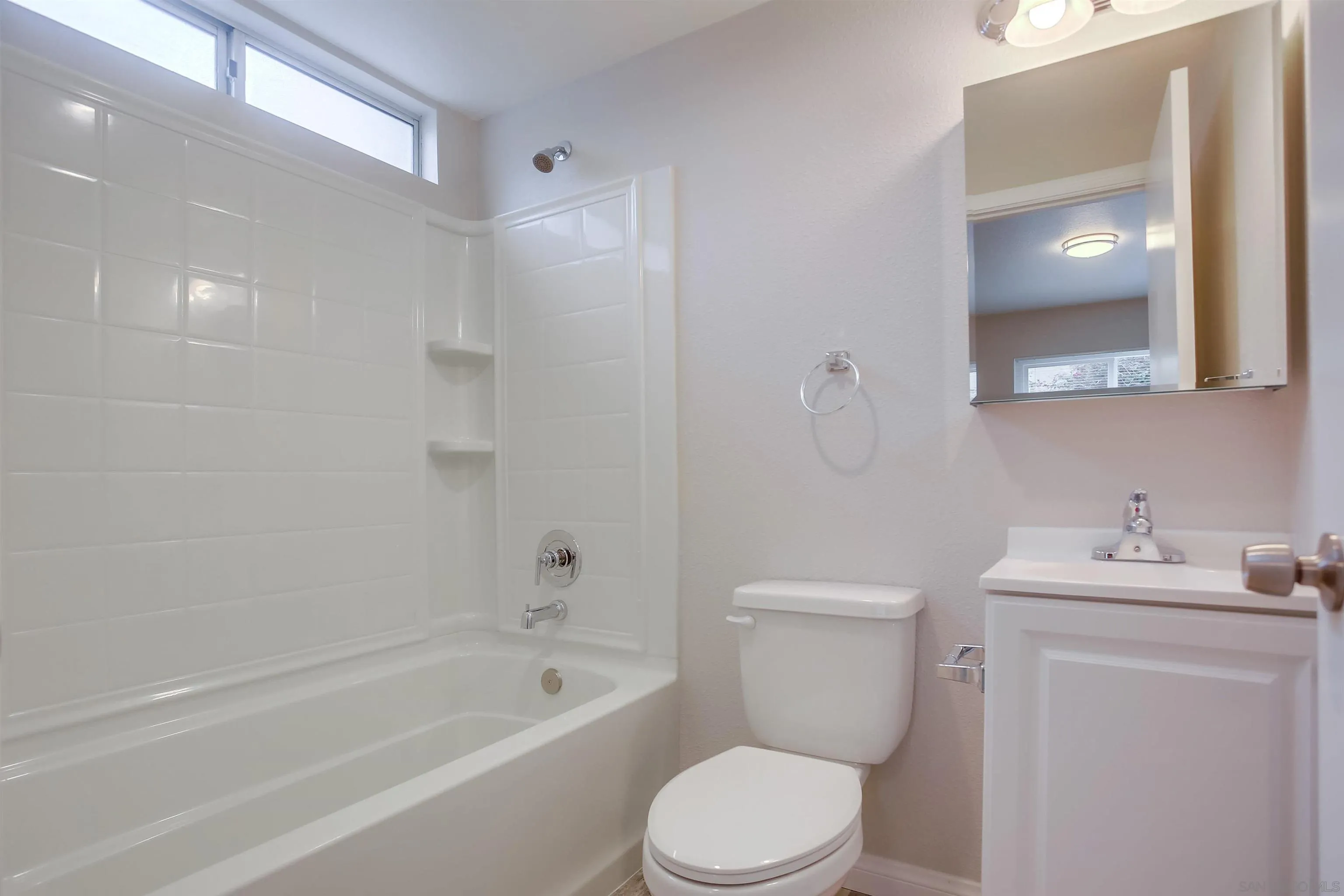 1055 Old Stage Road Fallbrook, CA 92028 - Photo 12 of 16 a bathroom with a sink a toilet and shower