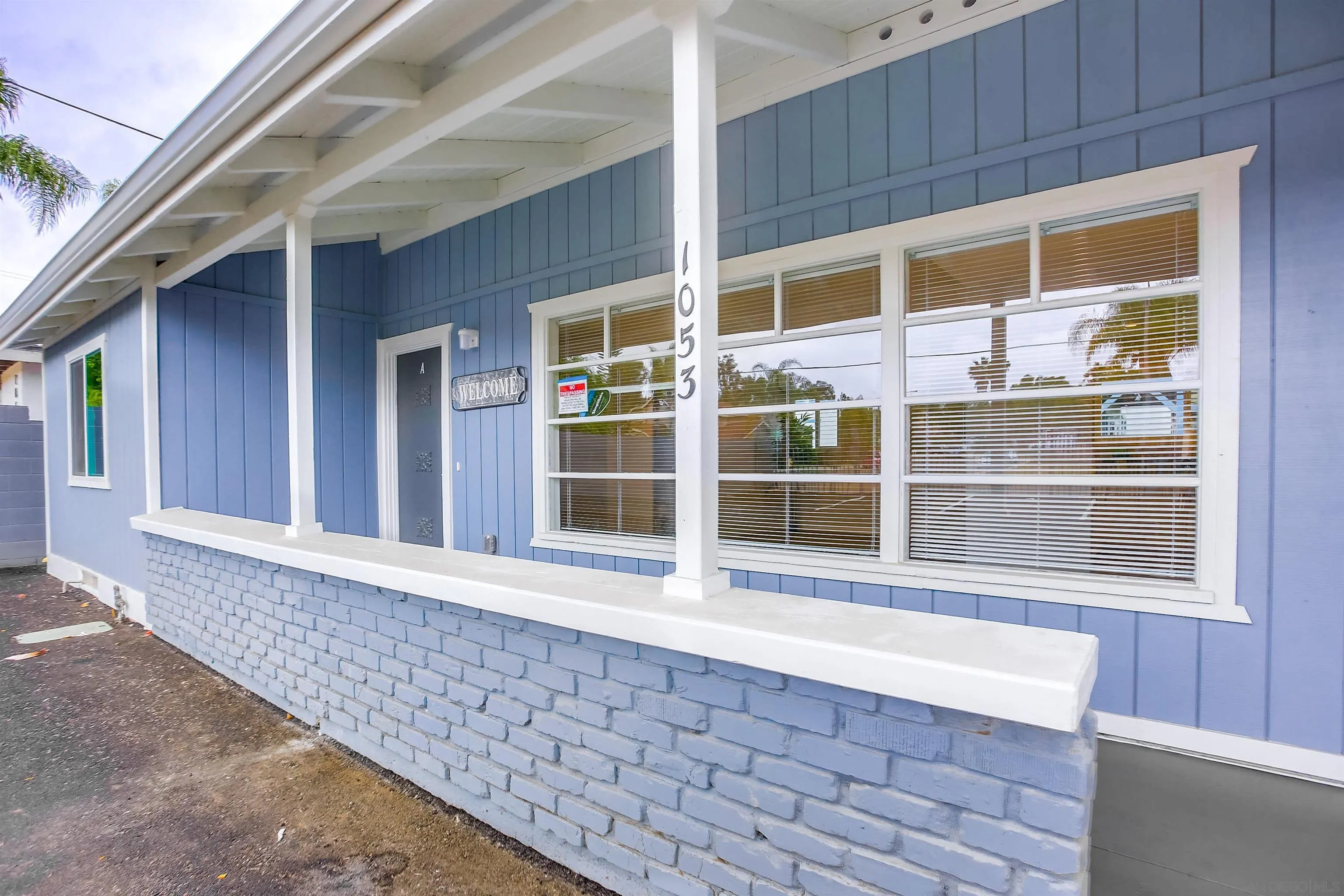 1055 Old Stage Road Fallbrook, CA 92028 - Photo 13 of 16 a view of a brick house with a large window