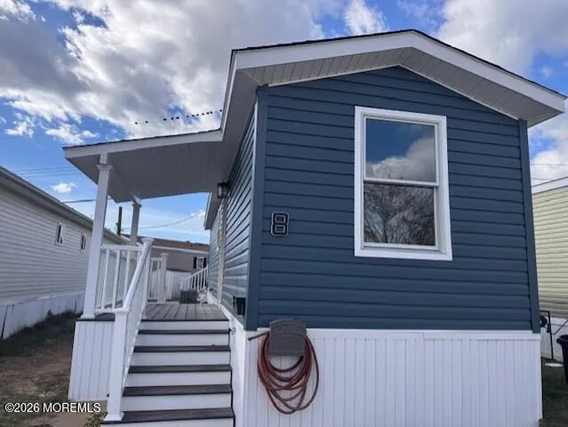 a front view of a house with a balcony