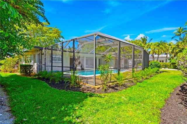 a view of sitting area in front of house