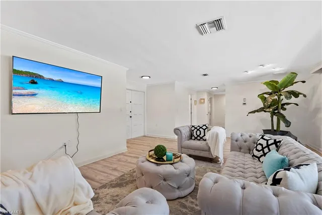 a bedroom with furniture and a couch