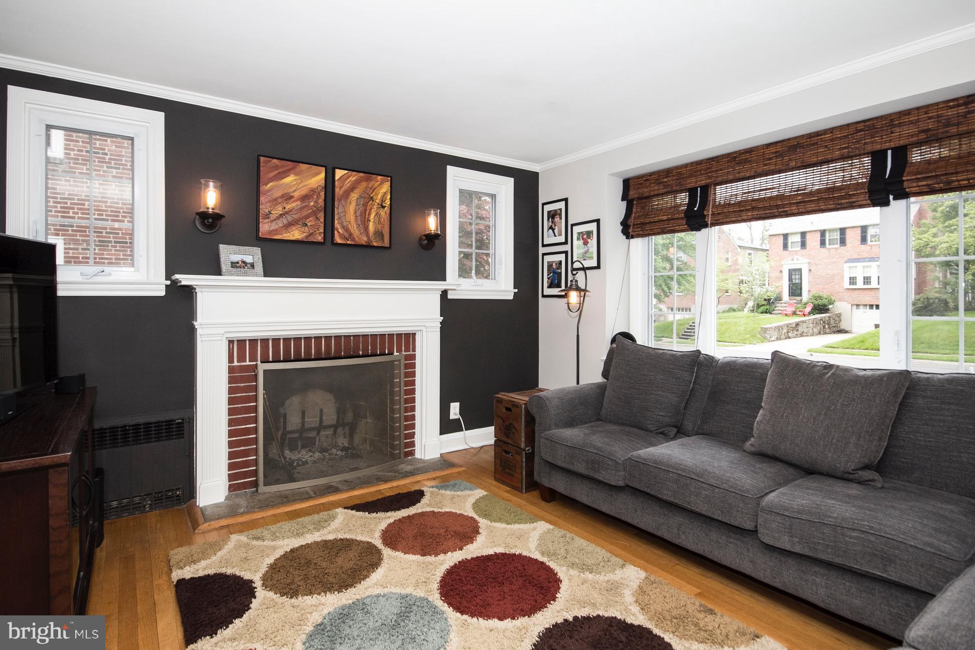 623 Overbrook Road Baltimore, MD 21212 - Photo 13 of 30 a living room with furniture and a fireplace