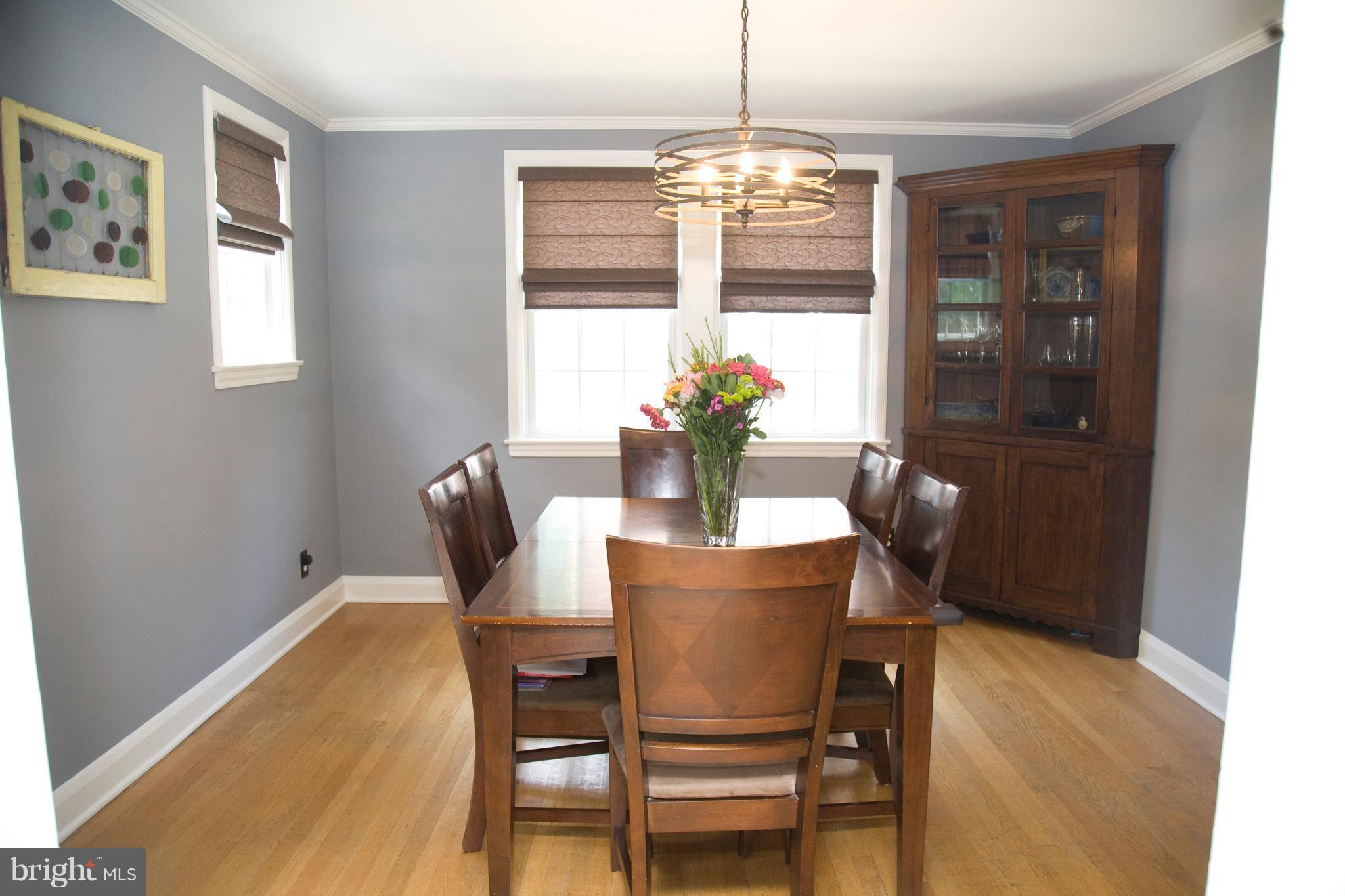 623 Overbrook Road Baltimore, MD 21212 - Photo 15 of 30 a dining room with furniture and chandelier