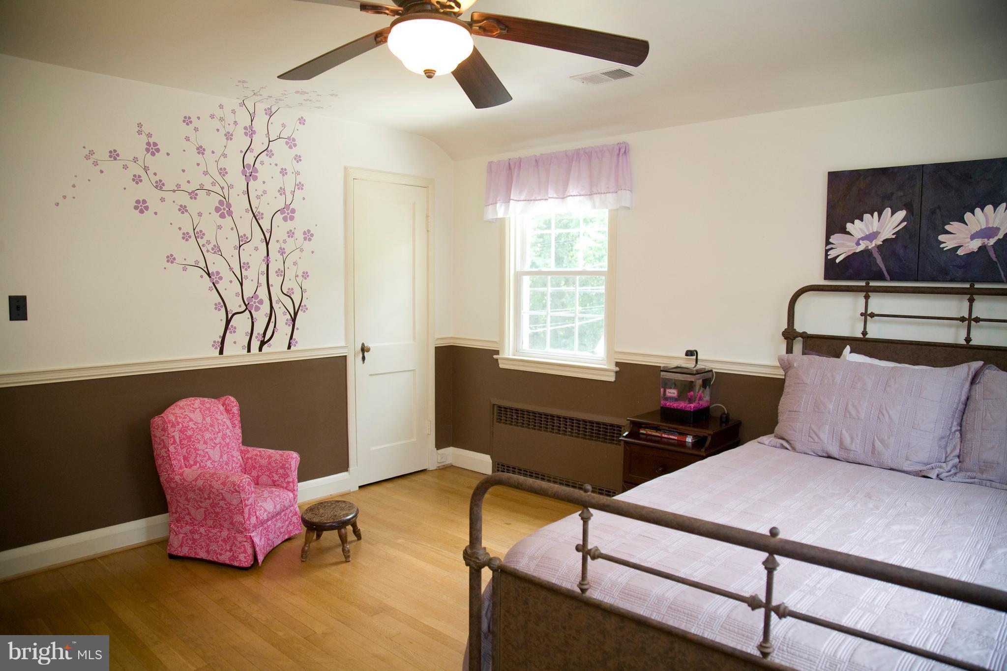 623 Overbrook Road Baltimore, MD 21212 - Photo 21 of 30 a bedroom with a bed and window