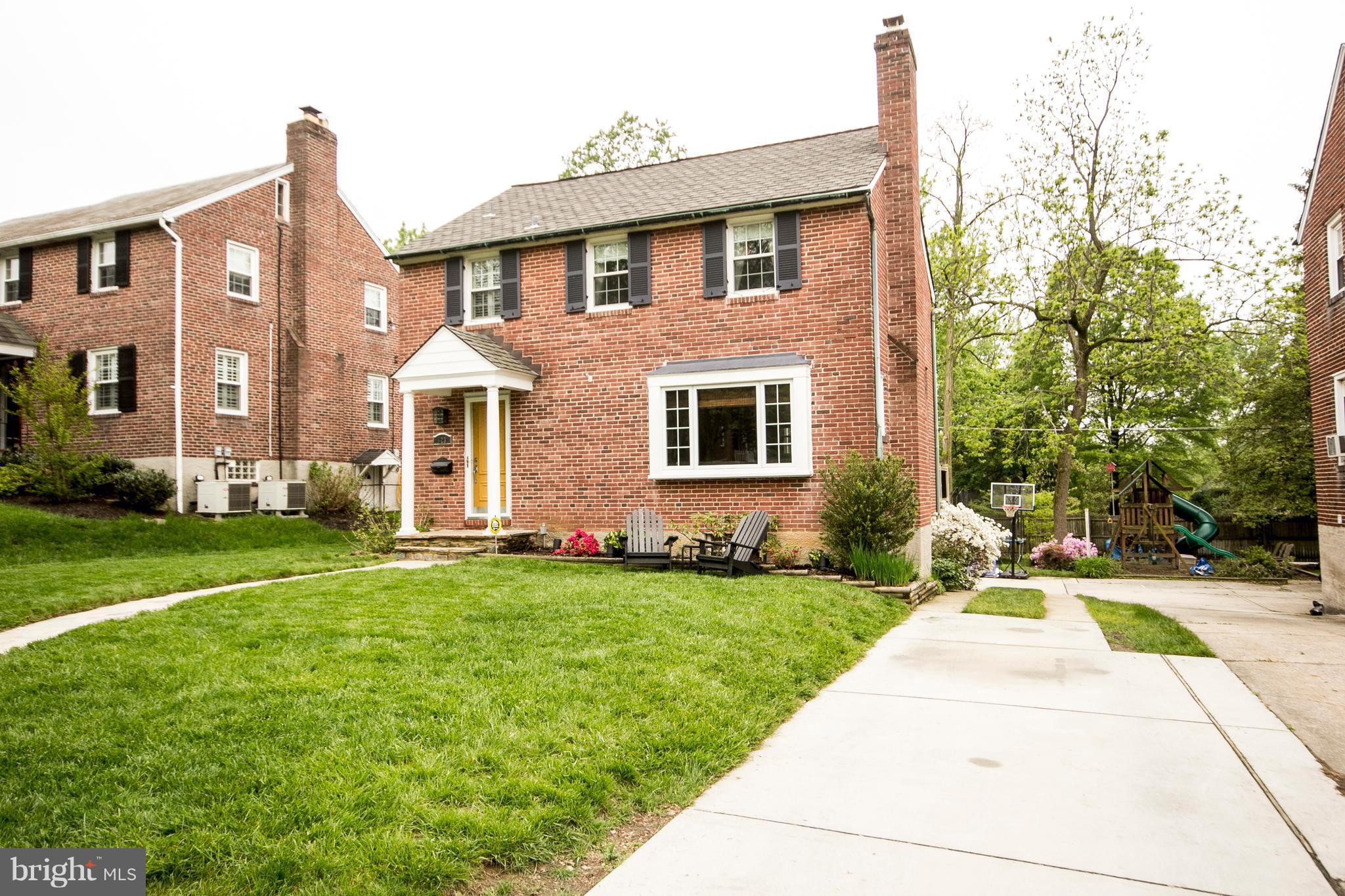 623 Overbrook Road Baltimore, MD 21212 - Photo 4 of 30 a front view of a house with a yard