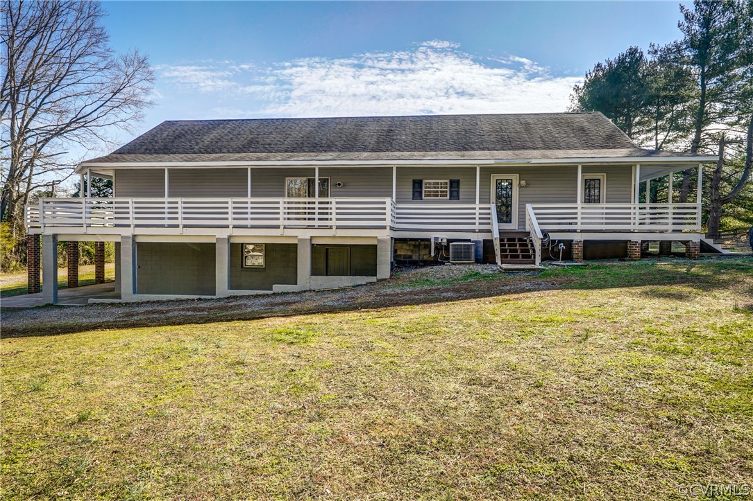528 Three Chopt Road Manakin-Sabot, VA 23103 - Photo 3 of 50 a front view of a house with a yard table and chairs