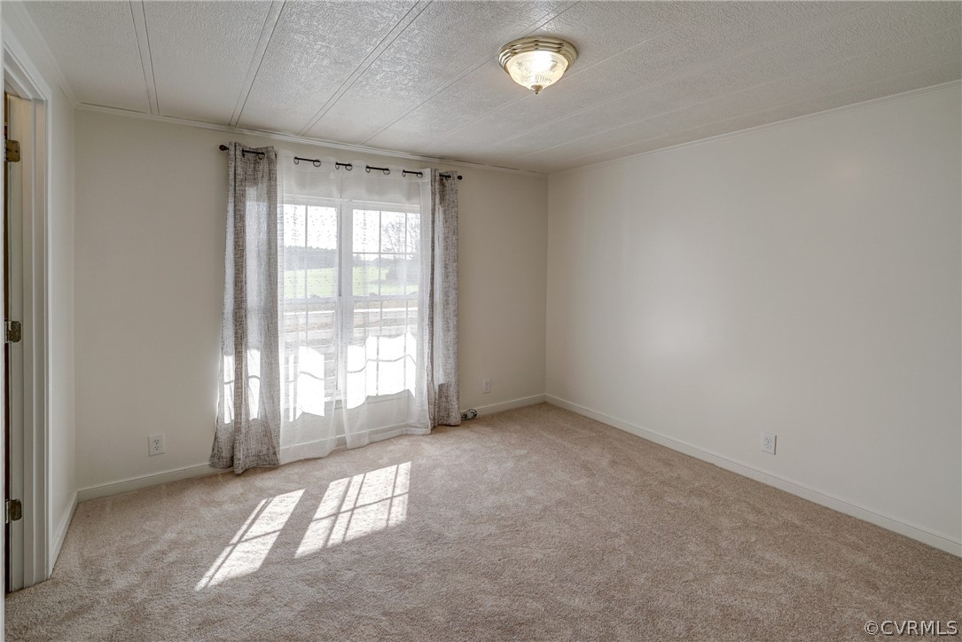 528 Three Chopt Road Manakin-Sabot, VA 23103 - Photo 33 of 50 an empty room with windows