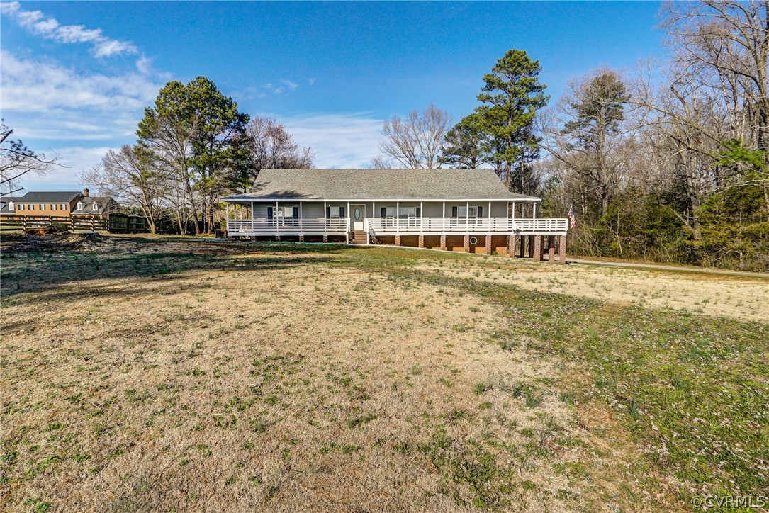 528 Three Chopt Road Manakin-Sabot, VA 23103 - Photo 48 of 50 a front view of a house with a yard