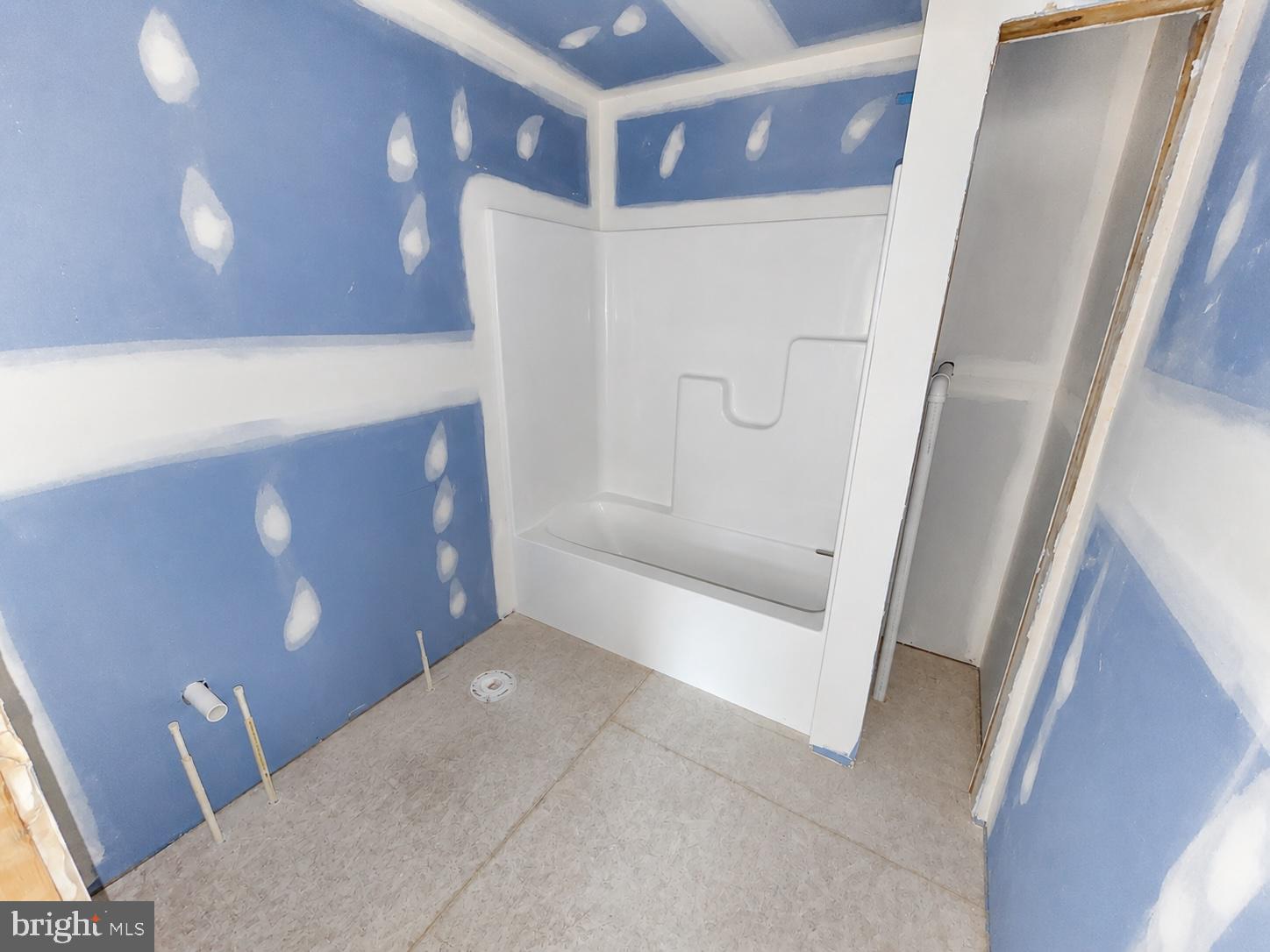 3 Libby's Ridge Road Berkeley Springs, WV 25411 - Photo 29 of 36 Freshly primed bathroom ready for design.