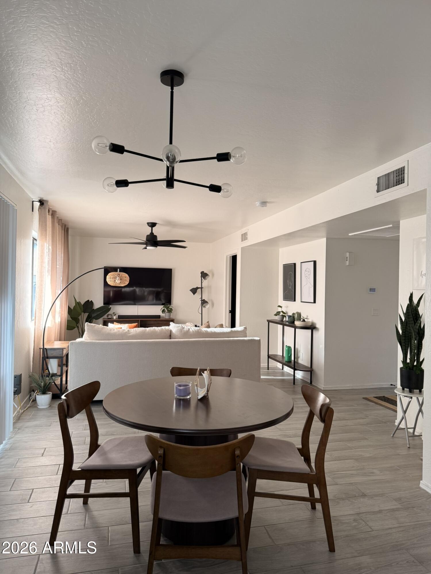 2554 West Kathleen Road Phoenix, AZ 85023 - Photo 12 of 22 a view of a dining room with furniture