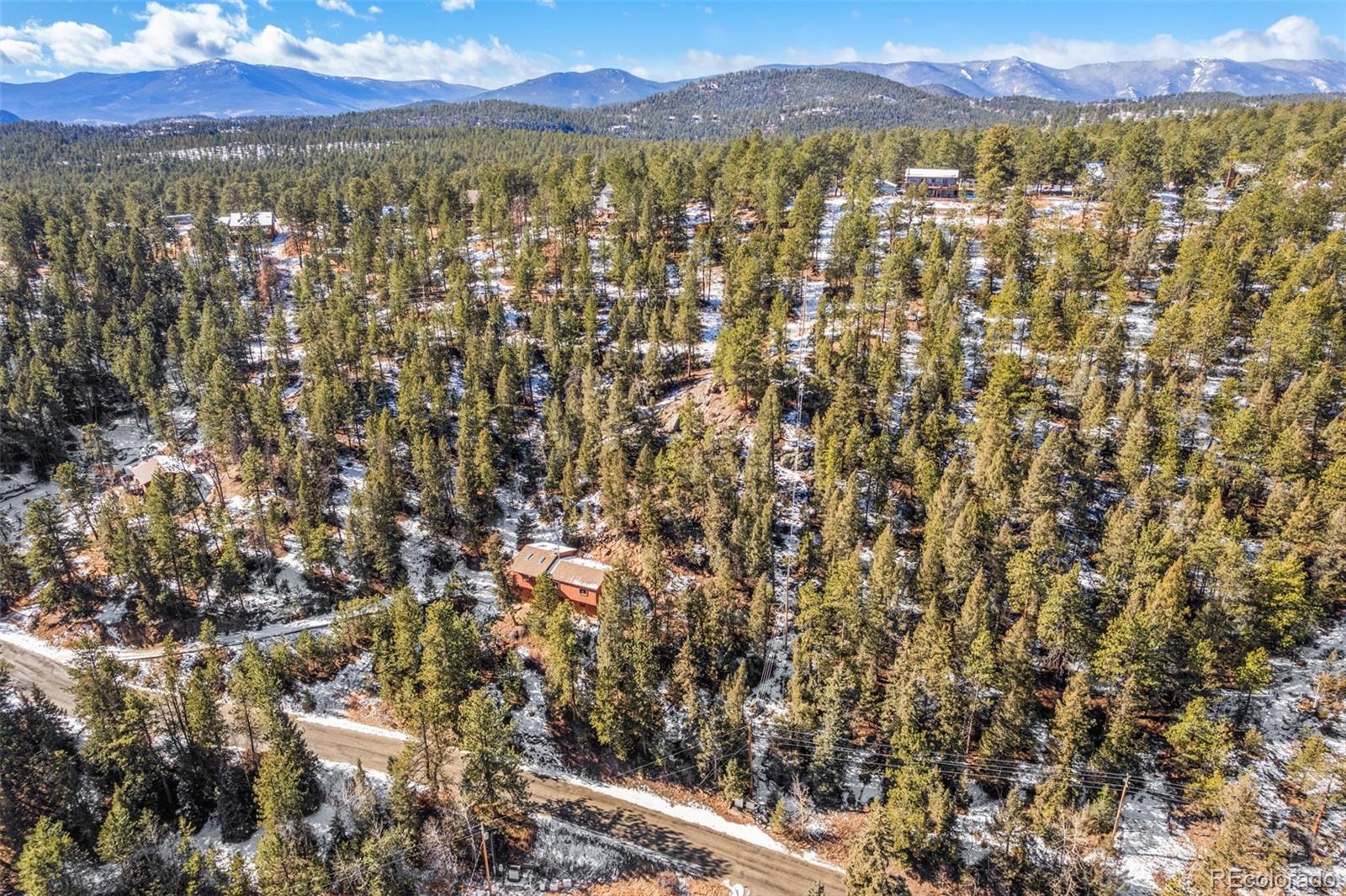 1269 Roland Drive Bailey, CO 80421 - Photo 35 of 38 a view of a city with mountain