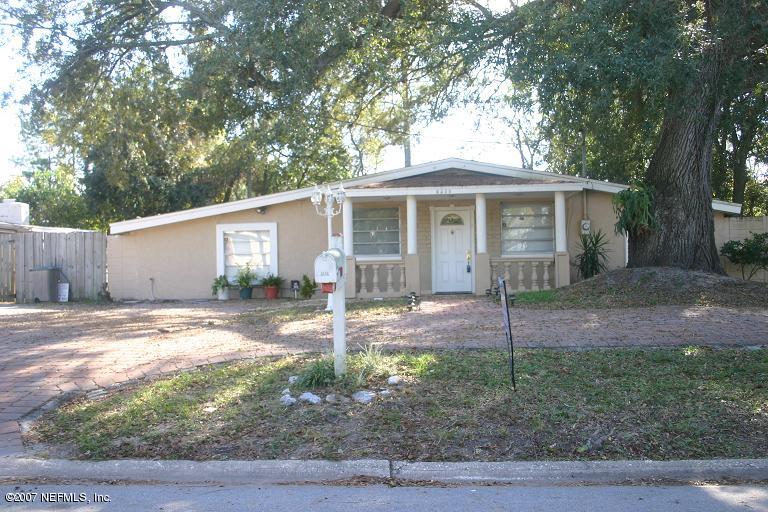 6536 Todd Road Jacksonville, FL 32216 - Photo 1 of 2 a view of a yard with a house and a large tree