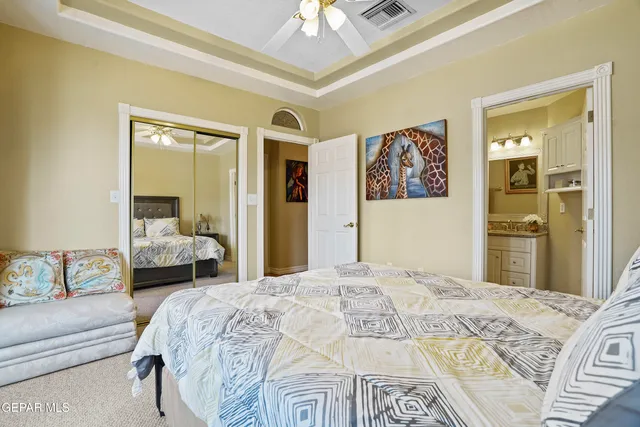 a view of a yard with a building in the background