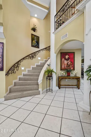 a view of an entryway with a chandelier