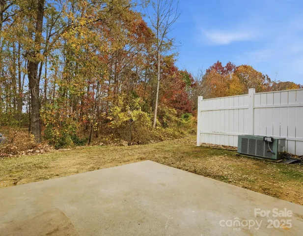 a view of a backyard of a house