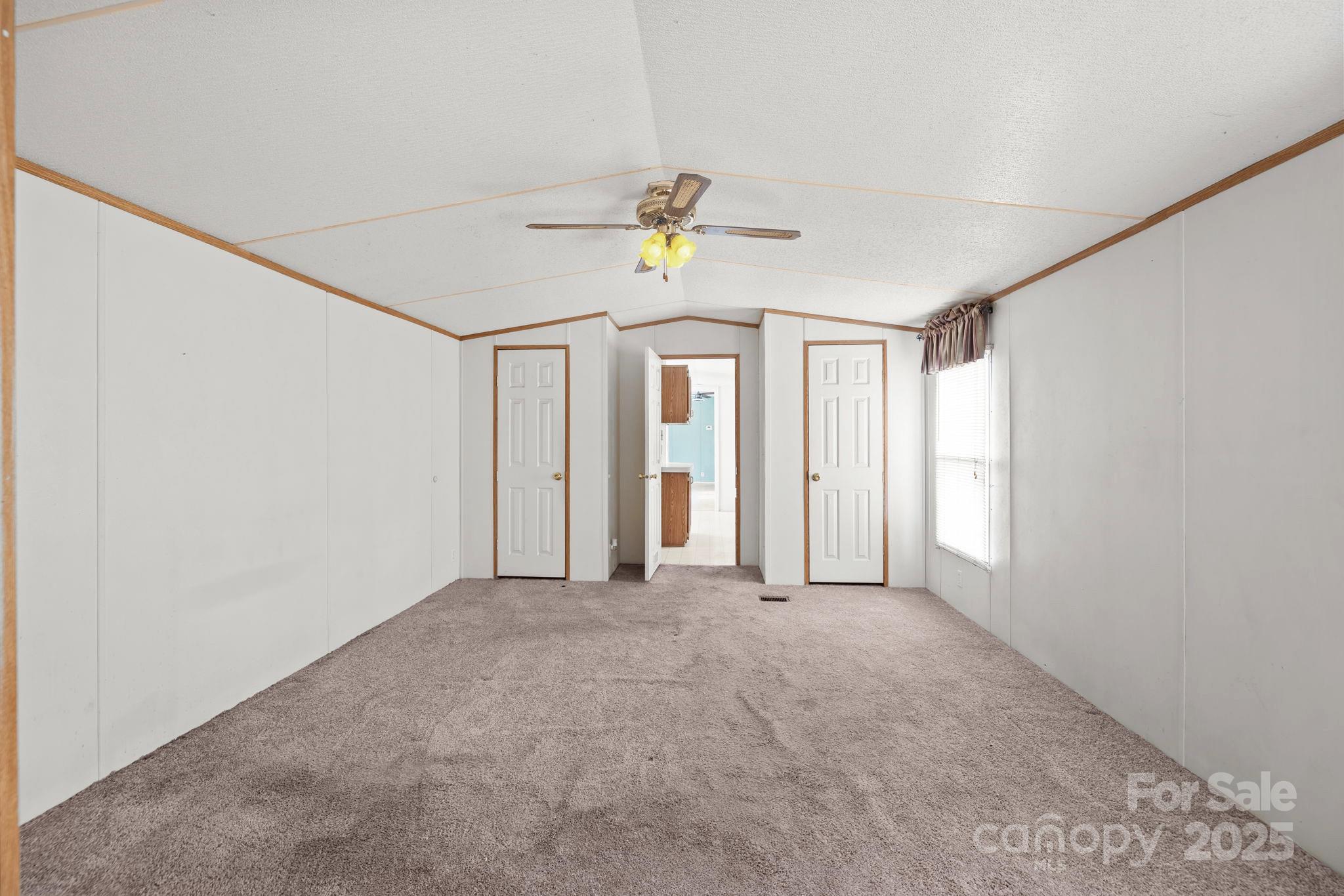 2909 New Town Road Monroe, NC 28110 - Photo 12 of 31 a view of an empty room with a window