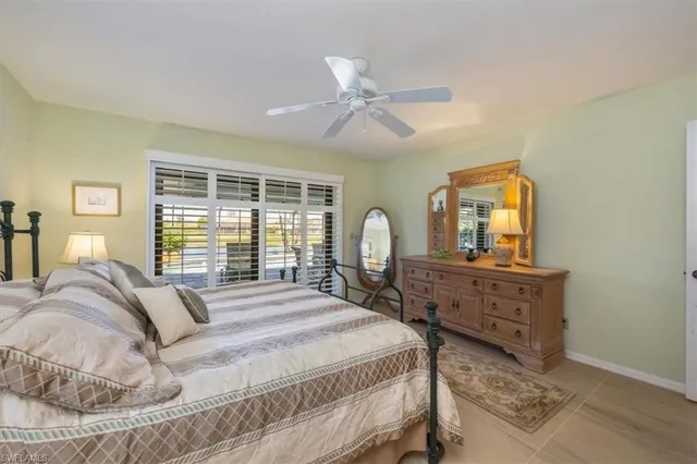 a bed room with a bed and a dresser