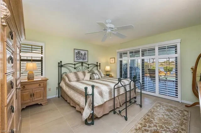 a bed room with a bed and a window