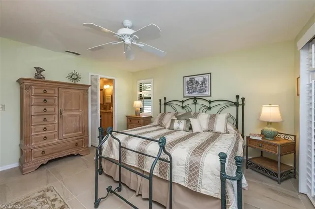 a bedroom with a bed and furniture