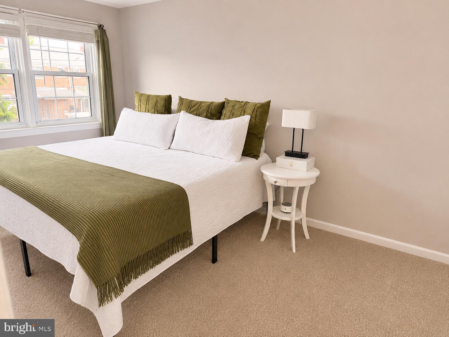 2235 Southorn Road Baltimore, MD 21220 - Photo 11 of 33 a bedroom with a bed and a window