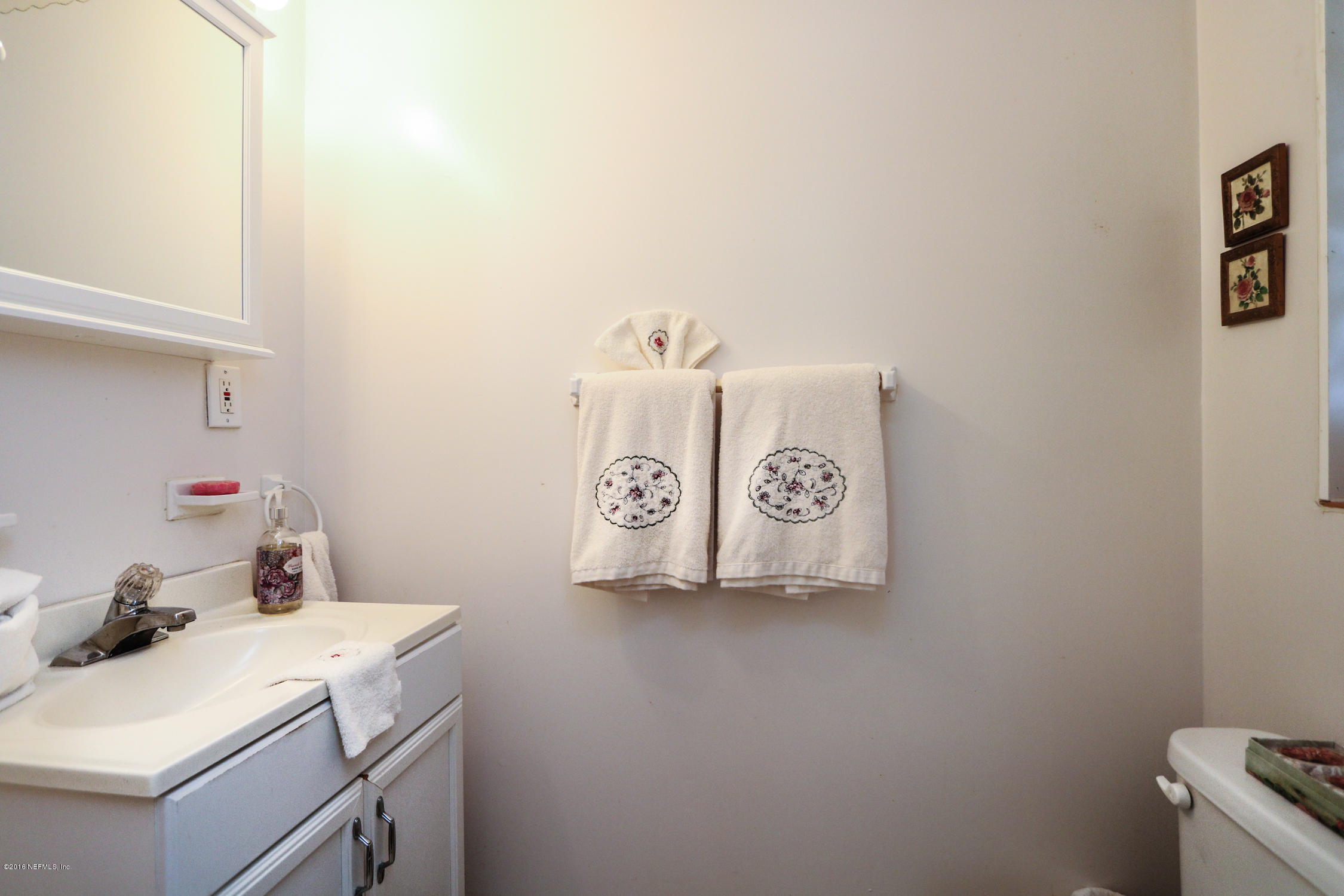 7648 Rambler Road Jacksonville, FL 32244 - Photo 19 of 29 a utility room with dryer and washer