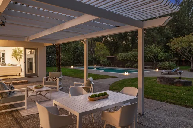 a backyard of a house with lots of green space