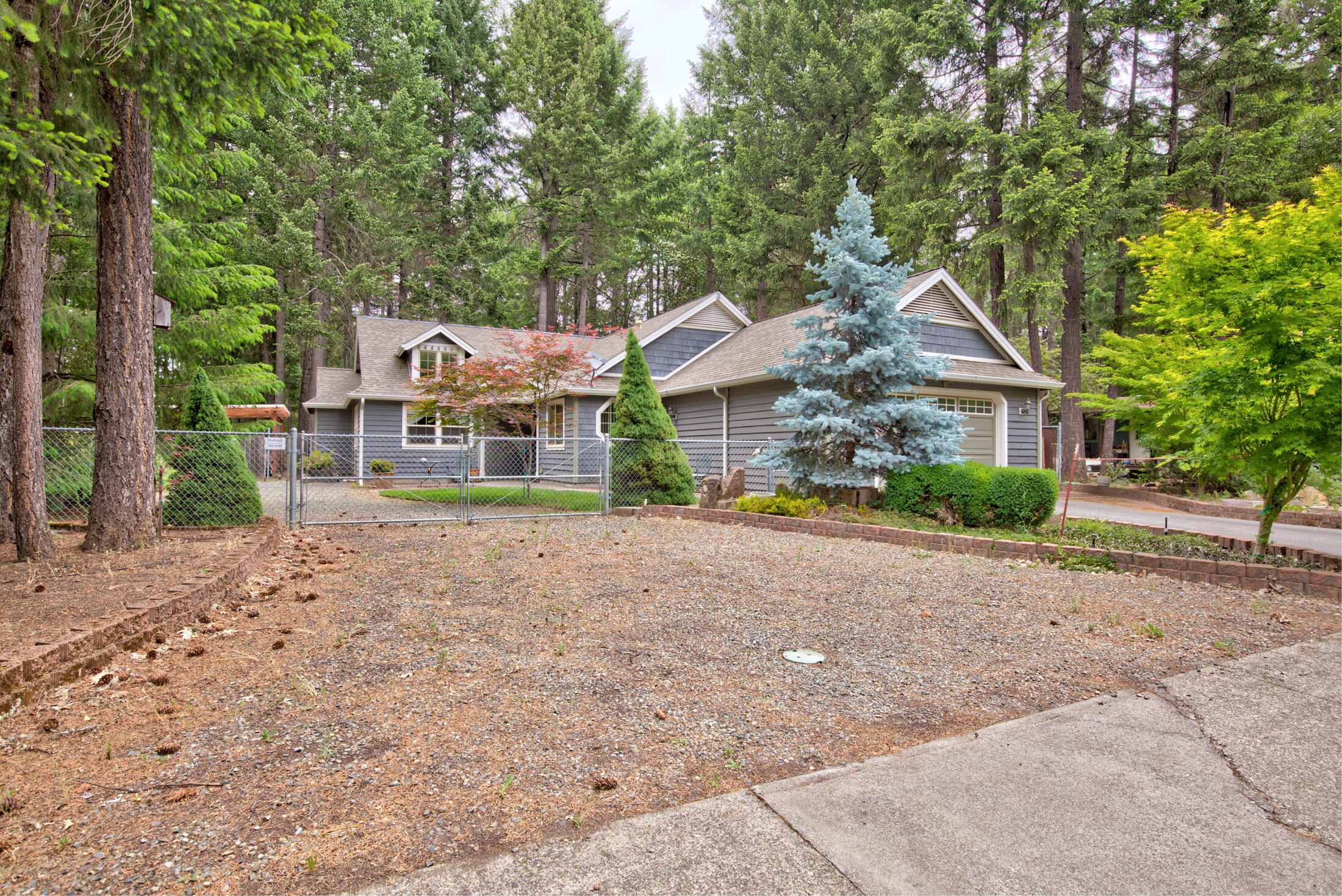 470 Addison Lane Cave Junction, OR 97523 - Photo 2 of 24 125A6075_6_7_8_9