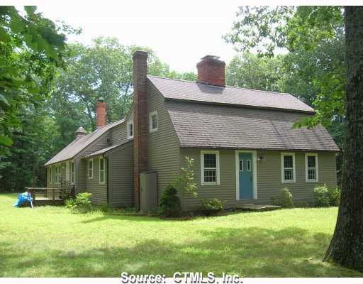 348 Riley Mountain Road Coventry, CT 06238 - Photo 1 of 1 a front view of a house with a yard