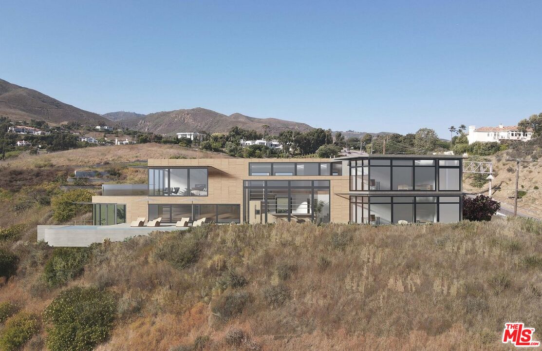 6111 Kanan Dume Road Malibu, CA 90265 - Photo 4 of 14 a view of a lake with a mountain in the background
