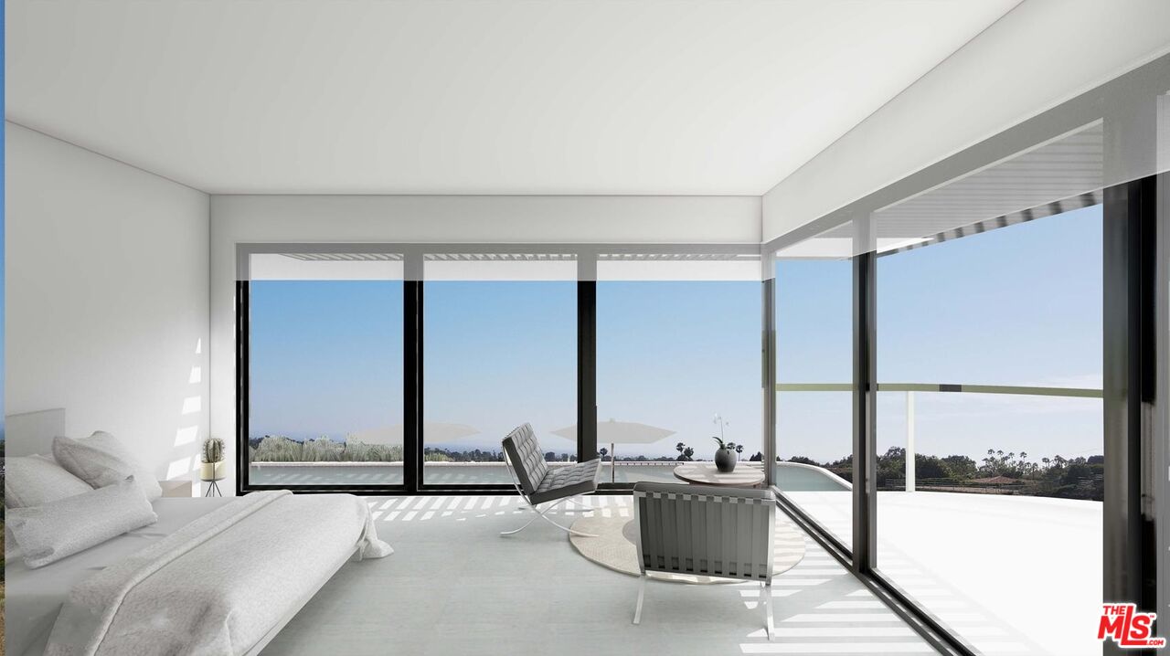 6111 Kanan Dume Road Malibu, CA 90265 - Photo 9 of 14 a bedroom with furniture and large windows