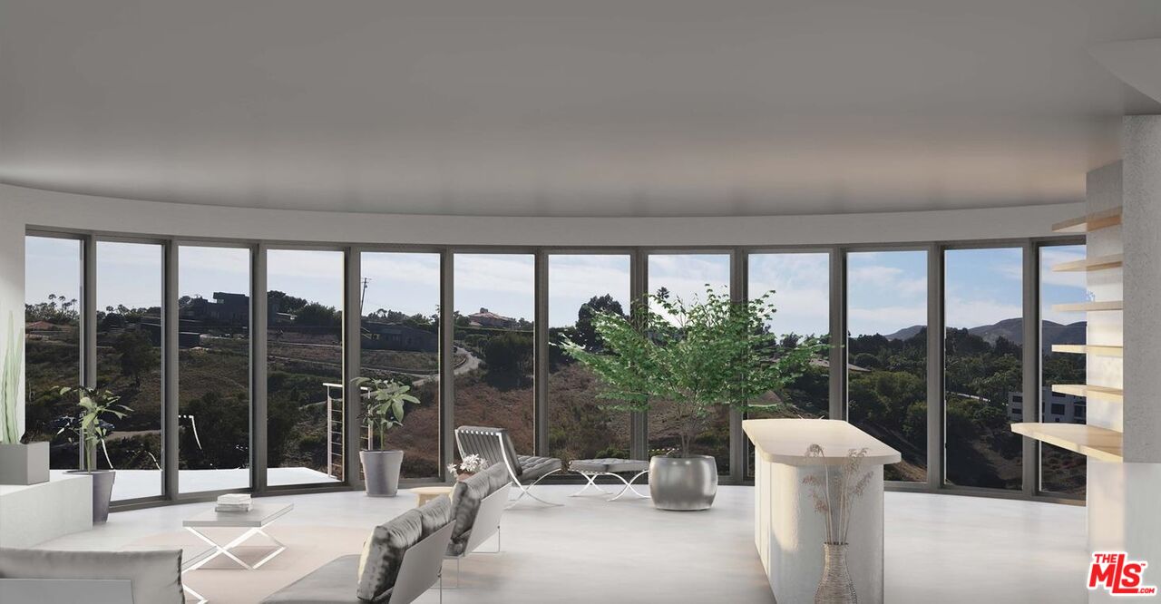 6111 Kanan Dume Road Malibu, CA 90265 - Photo 10 of 14 a view of a city from a balcony with lake view