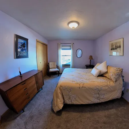 a bathroom with a sink toilet and mirror