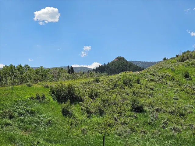 a view of a lake with a mountain in the background