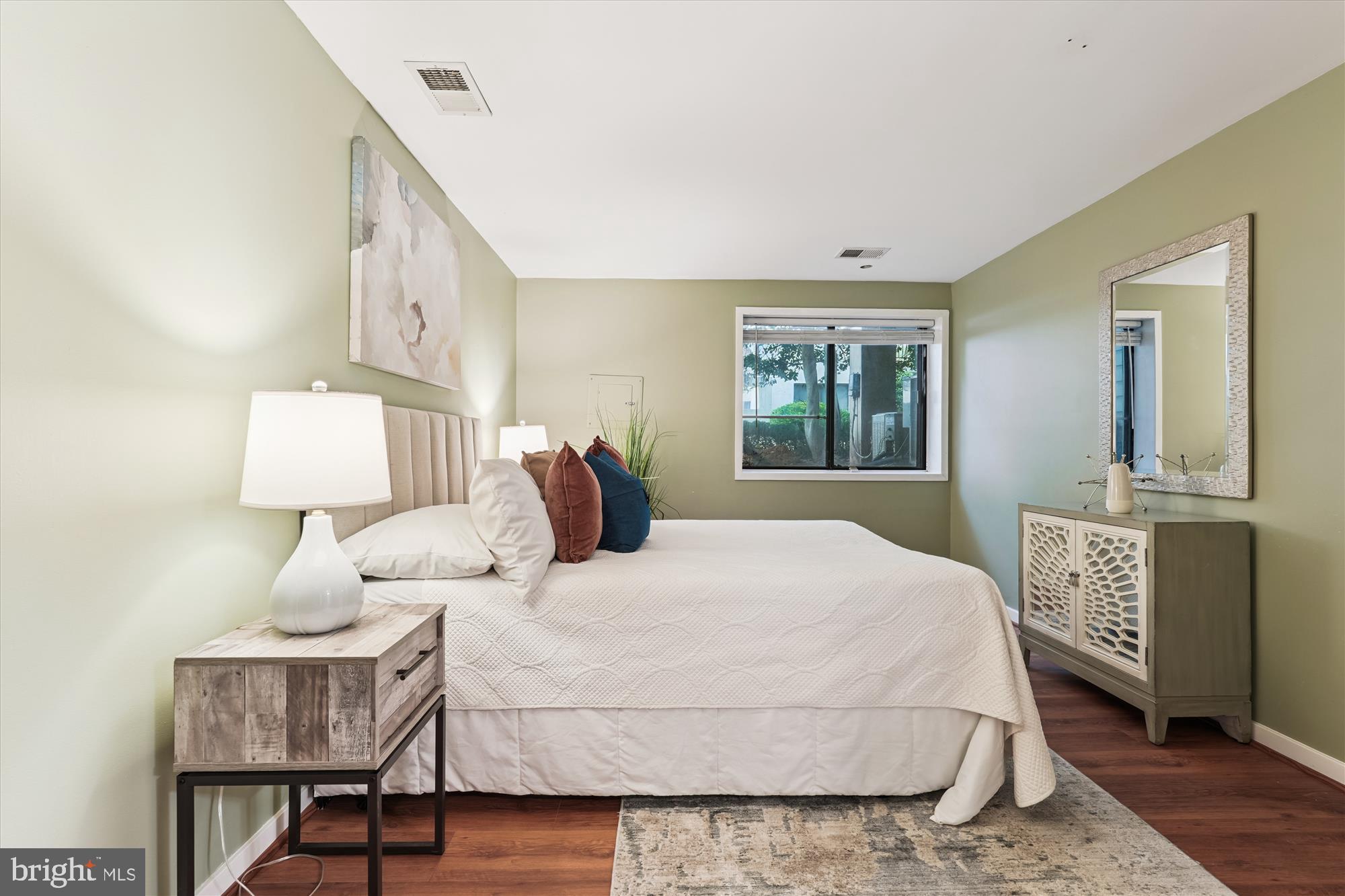 9731 Hellingly Place, Unit 37 Montgomery Village, MD 20886 - Photo 11 of 20 a bedroom with a bed and a table in it