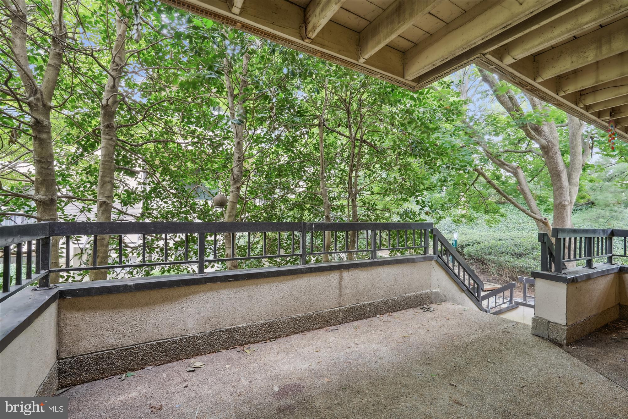 9731 Hellingly Place, Unit 37 Montgomery Village, MD 20886 - Photo 19 of 20 a view of a bench in the roof deck