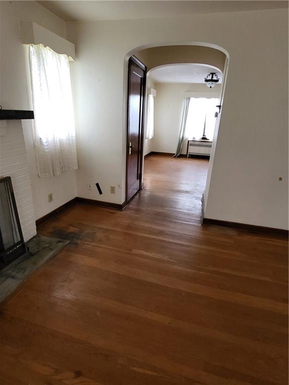 1003 Maple Avenue Turtle Creek, PA 15145 - Photo 4 of 24 a view of a livingroom with wooden floor