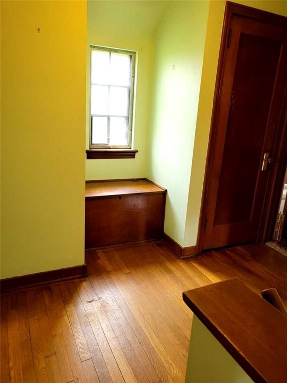 1003 Maple Avenue Turtle Creek, PA 15145 - Photo 10 of 24 a room with wooden floor and a window