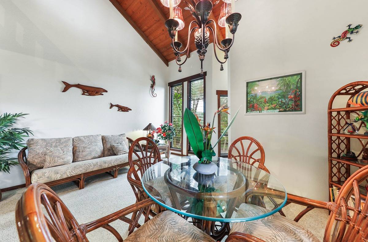 2721 Poipu Road, Unit 133 Koloa, HI 96756 - Photo 3 of 18 a living room with furniture and a potted plant