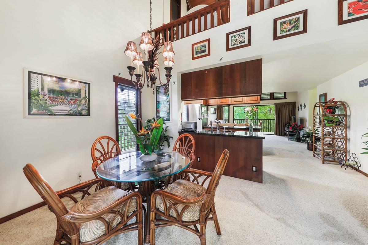 2721 Poipu Road, Unit 133 Koloa, HI 96756 - Photo 4 of 18 a view of a dining room with furniture and chandelier