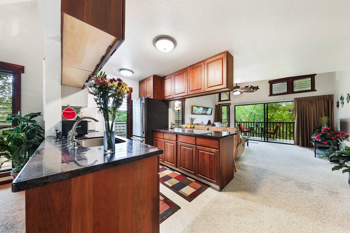 2721 Poipu Road, Unit 133 Koloa, HI 96756 - Photo 5 of 18 a room with furniture and a potted plant