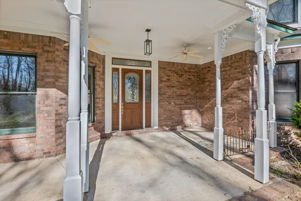 a view of a bathroom with a glass door