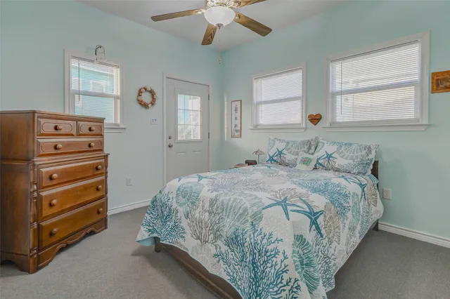 a bedroom with a bed and a cabinets