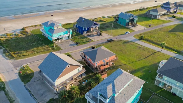 a view of houses with an outdoor space and seating