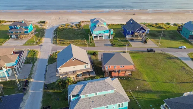 an aerial view of a house with swimming pool