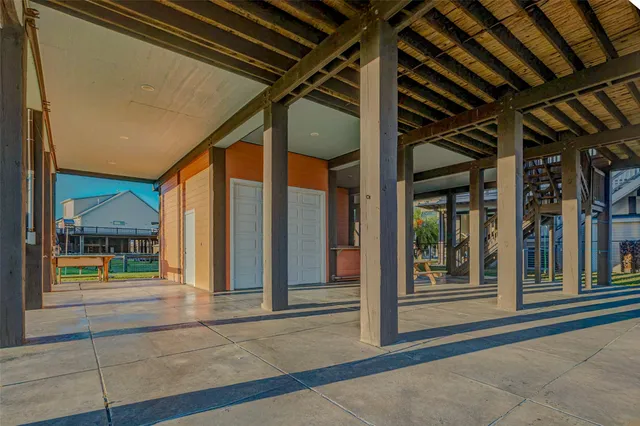 a balcony view with furniture and wooden floor