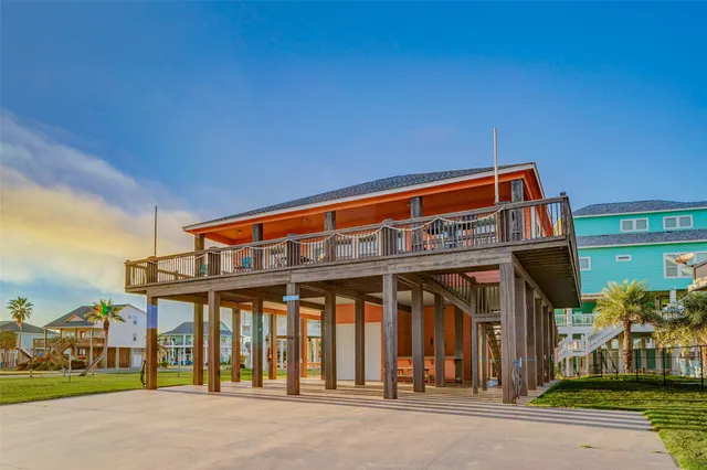 a view of a balcony with an ocean view