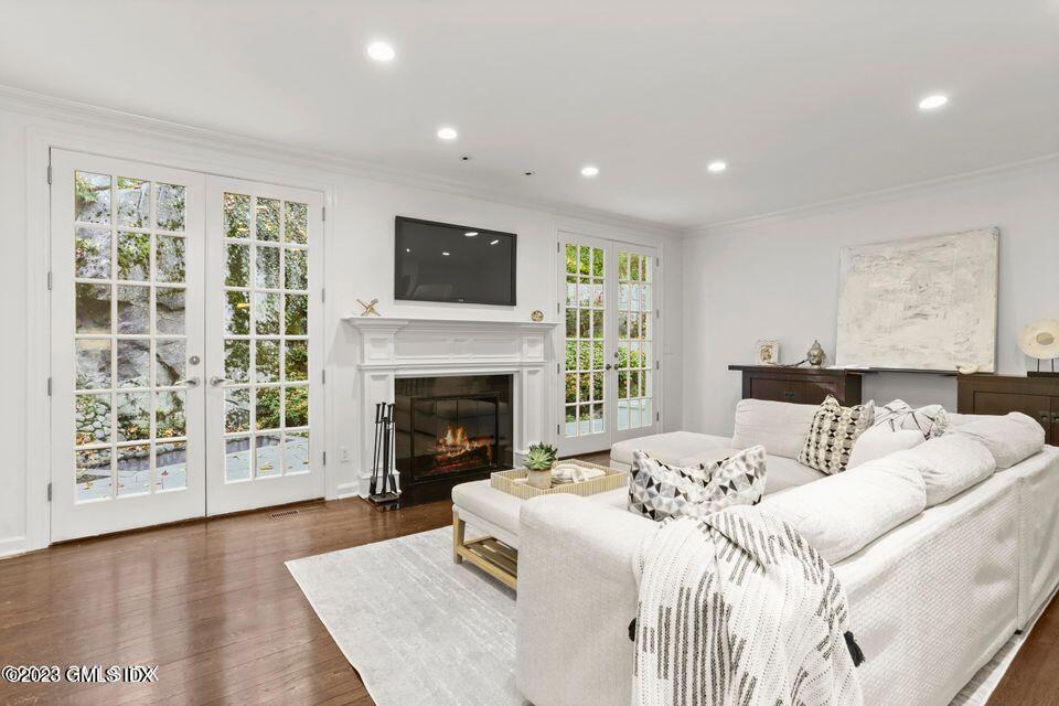 26 Round Hill Road Greenwich, CT 06831 - Photo 12 of 38 Family Room Opens to Terrace