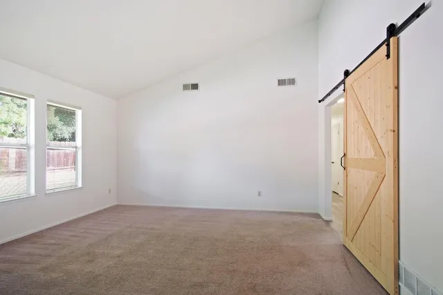 an empty room with windows