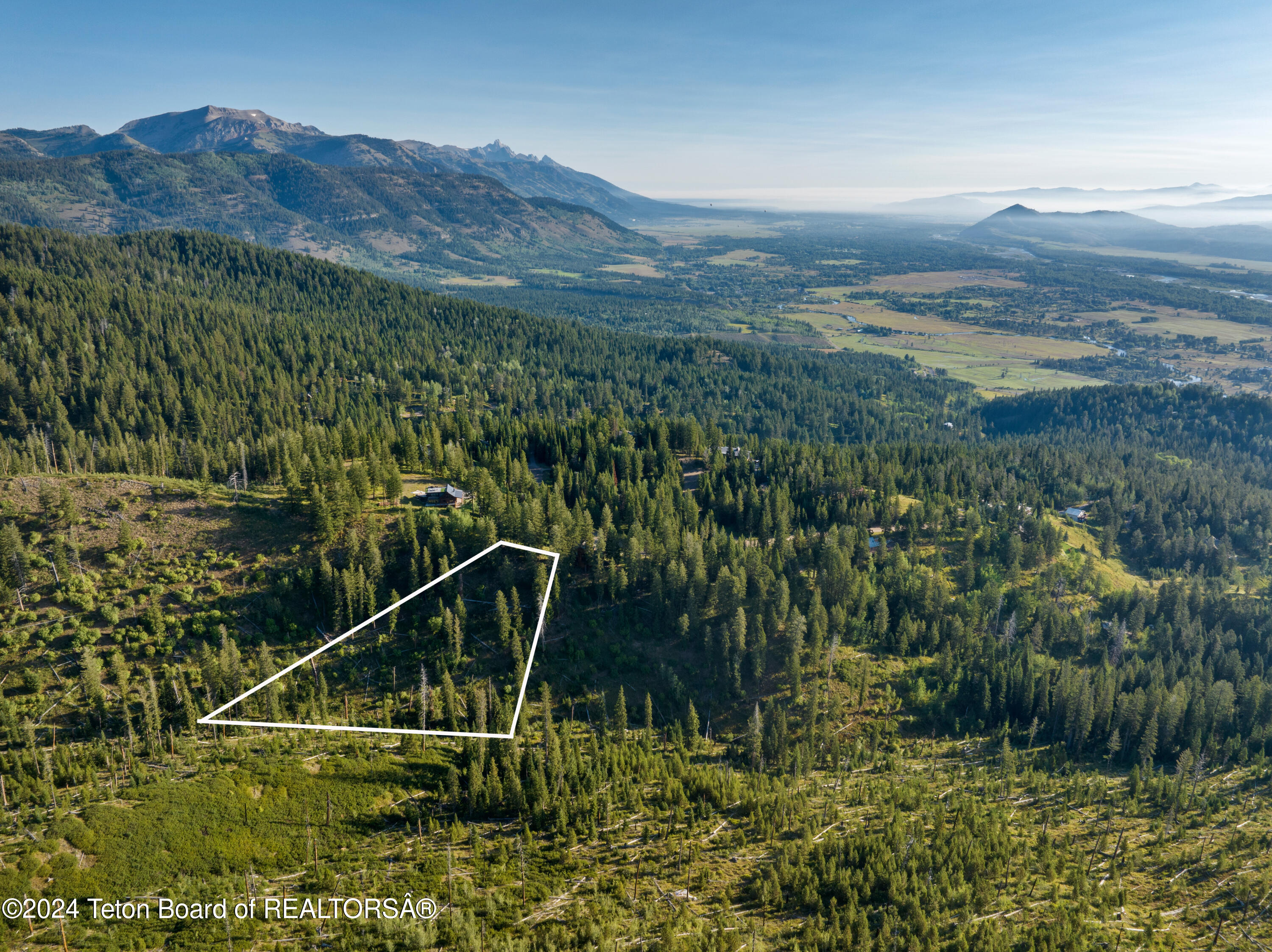 6880 Lupine Trail Wilson, WY 83014 - Photo 1 of 9 Elevated and wooded
